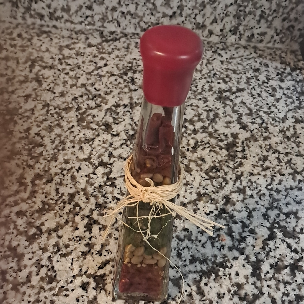 Red Glass Art Bottle with Decorative Design